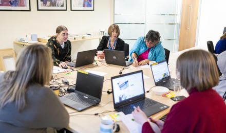 VoiceBox & RVSP members reviewing Hightown's website