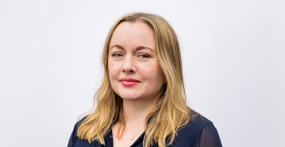 Headshot of Sarah Barton, member of Hightown's board. She is wearing a navy blouse and has long blonde hair and blue eyes. Headshot of Sarah Barton, member of Hightown's board. She is wearing a navy blouse and has long blonde hair and blue eyes.
