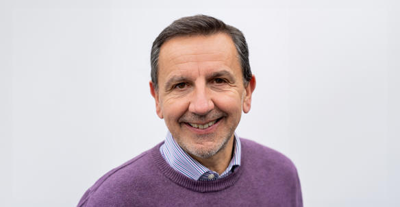 Headshot of Andrew Royall, Director of Development. He is wearing a purple jumper and a purple, white and blue striped shirt. Headshot of Andrew Royall, Director of Development. He is wearing a purple jumper and a purple, white and blue striped shirt.