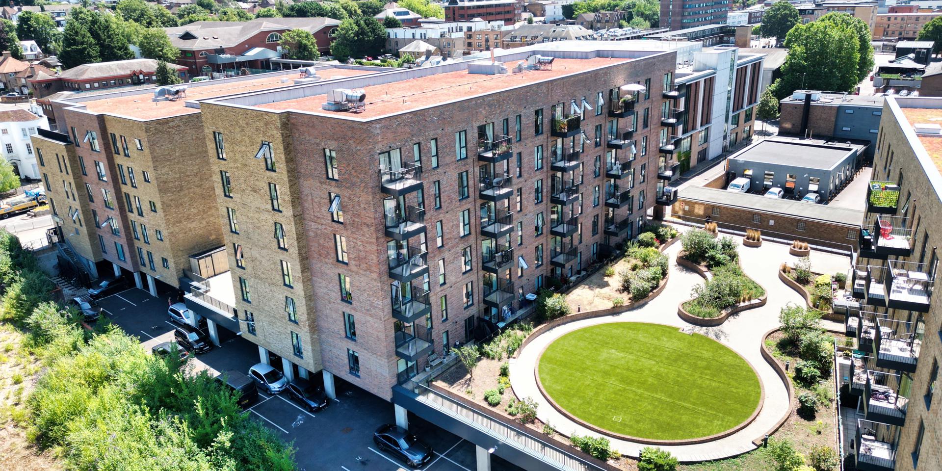 A birds-eye view of the building showing the landscaped gardens